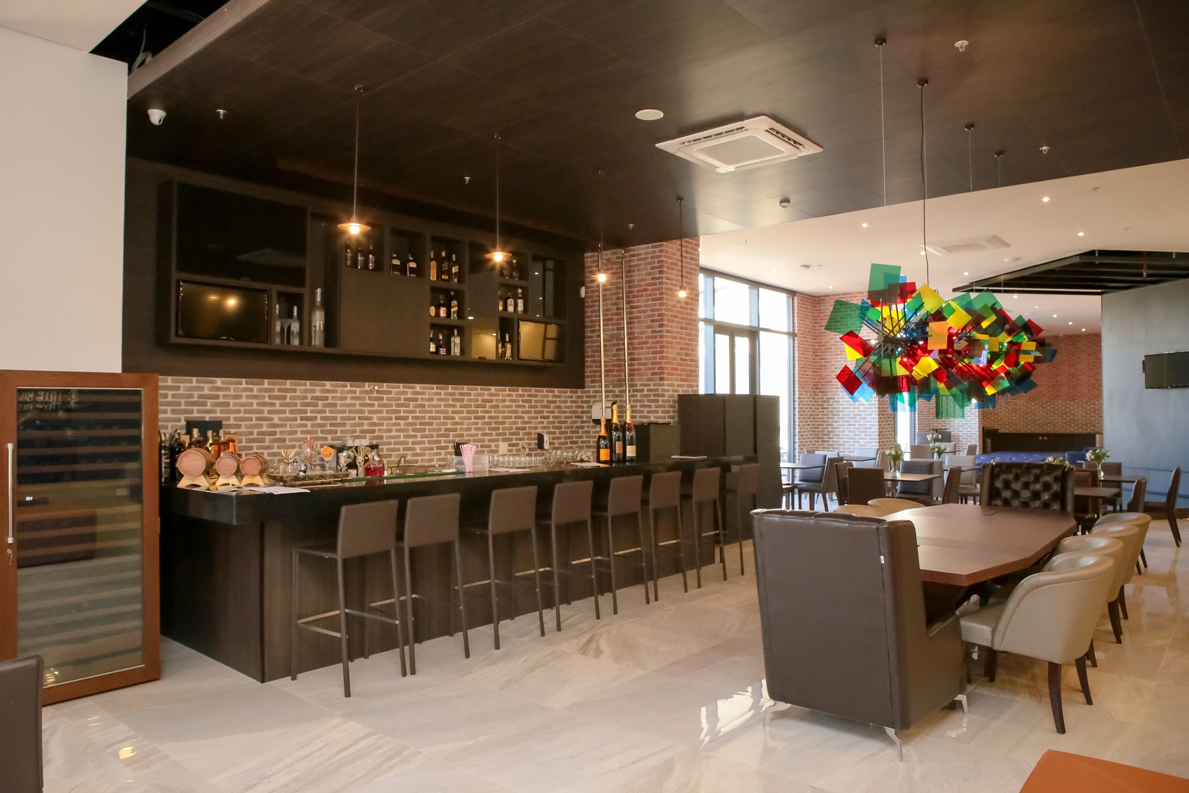 Tryp By Wyndham Ribeirao Preto Hotel Bagian luar foto The interior of the restaurant