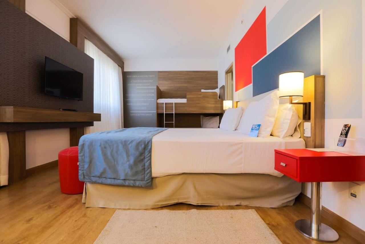 Tryp By Wyndham Ribeirao Preto Hotel Bagian luar foto A room at the hotel