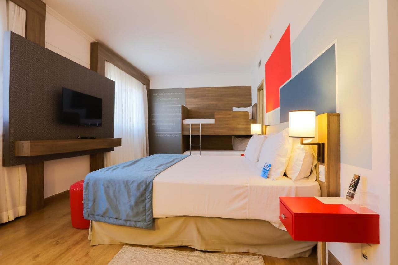 Tryp By Wyndham Ribeirao Preto Hotel Bagian luar foto A room at the hotel